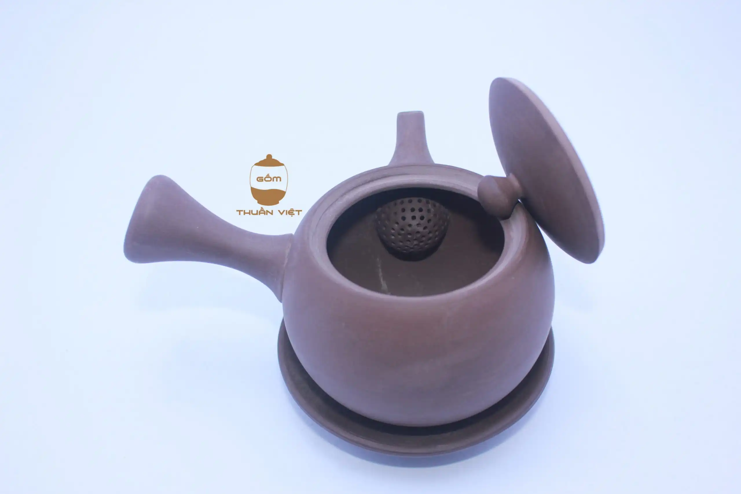 Ấm nâu lòng gốm hướng tâm