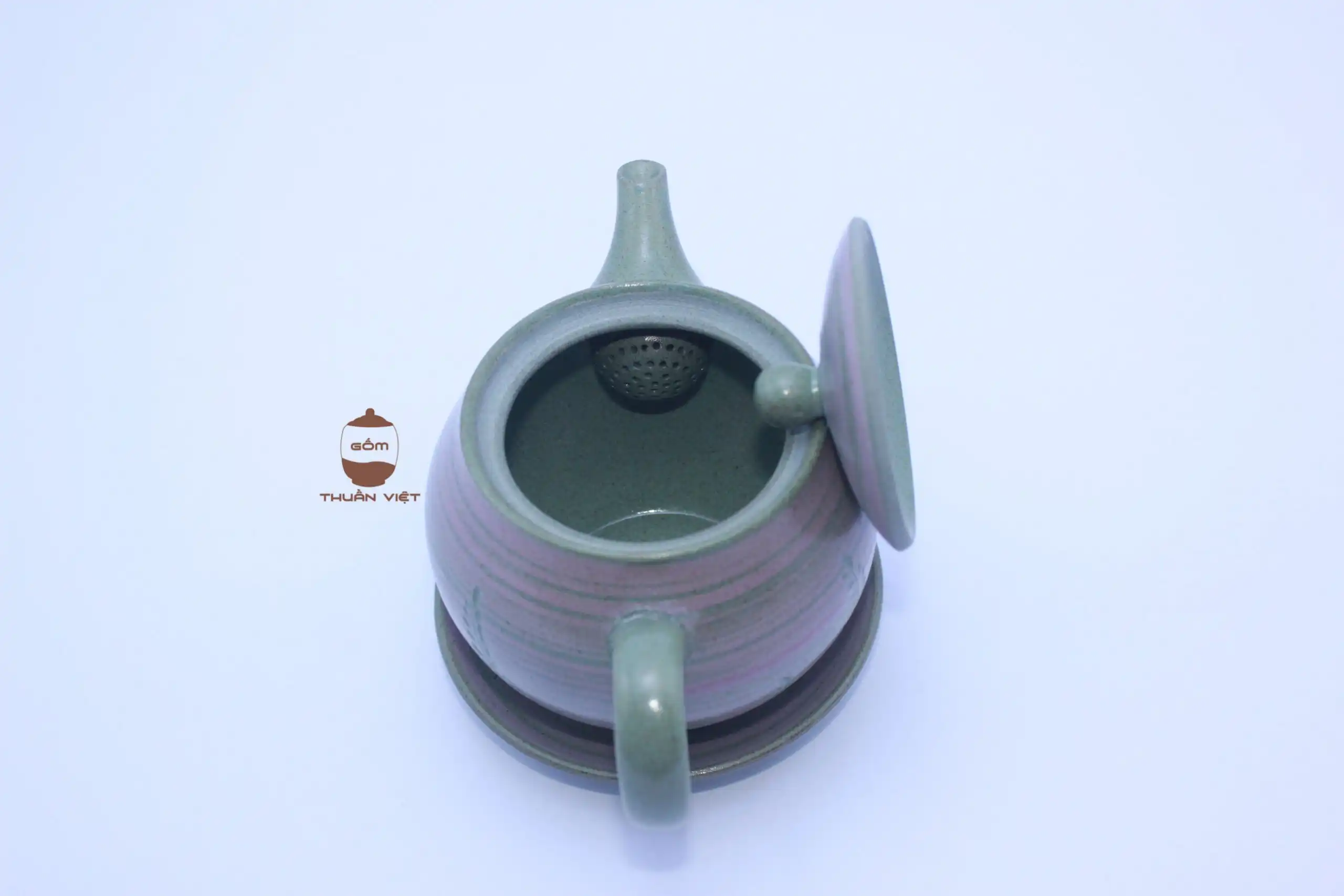 Ấm tím xanh vẽ cỏ