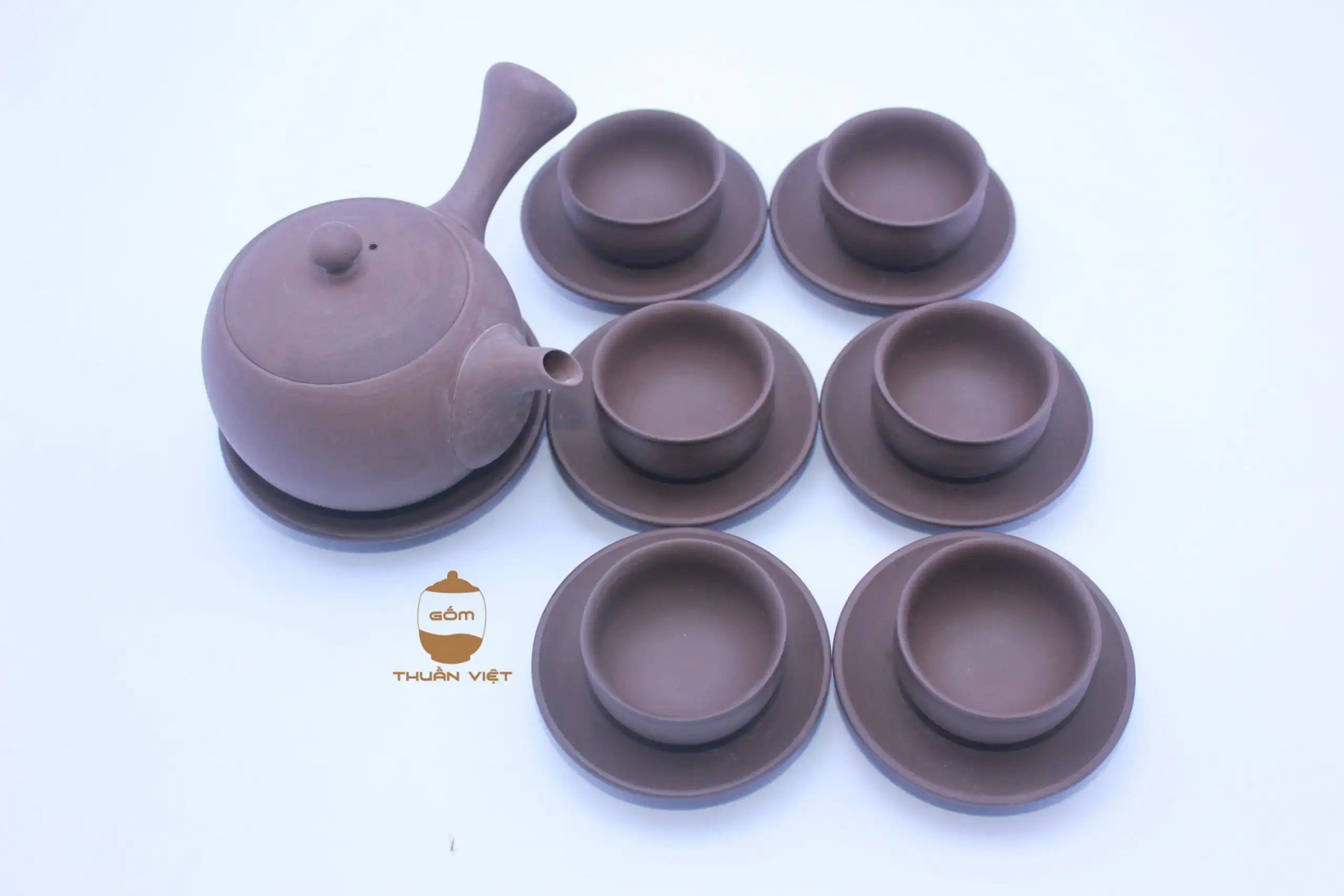 Bộ ấm nâu lòng gốm hướng tâm
